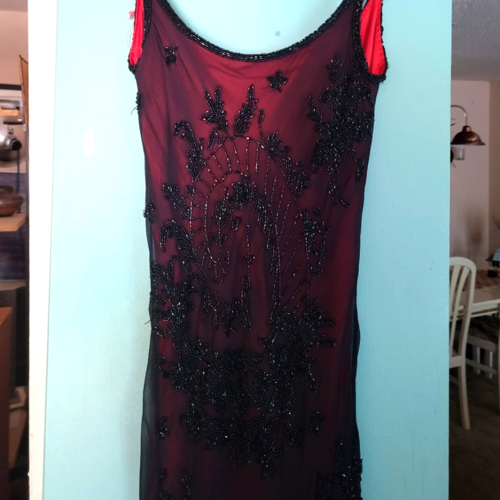 Burgundy beaded bagatelle gown